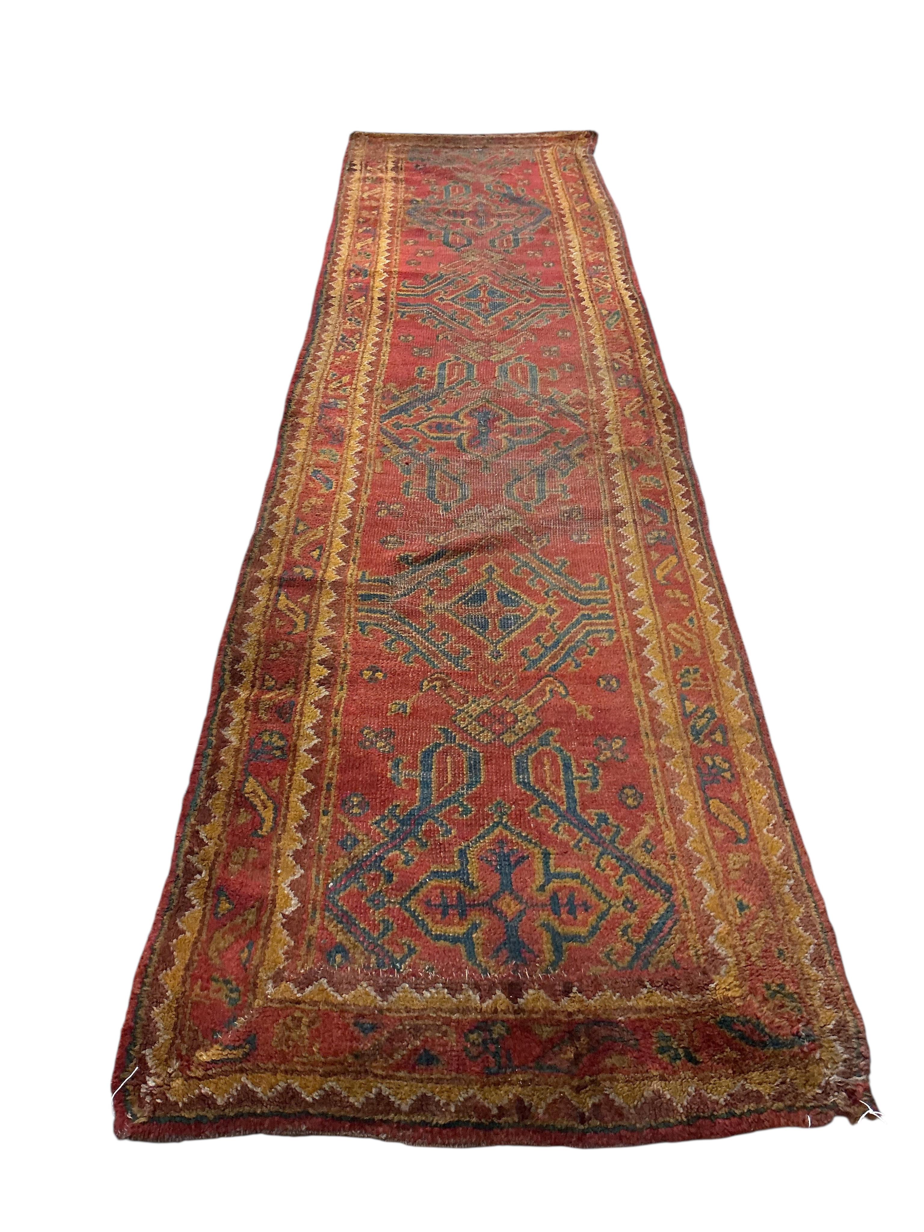 A Turkish Ousak runner, 396 x 96cm